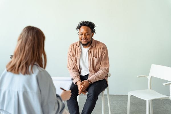 Man in a Psychotherapy Session with a Psychologist Man in a Psychotherapy Session with a Psychologist